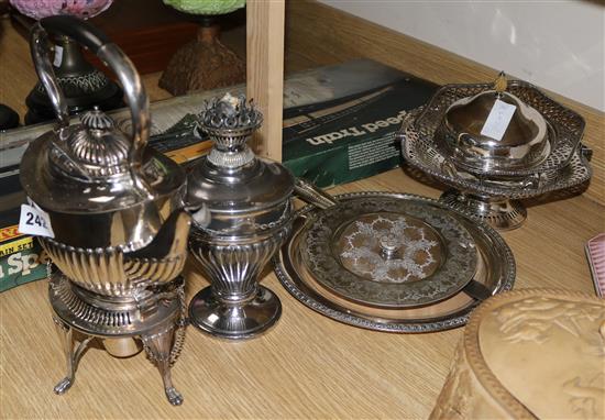A plated oil lamp, a kettle on stand etc